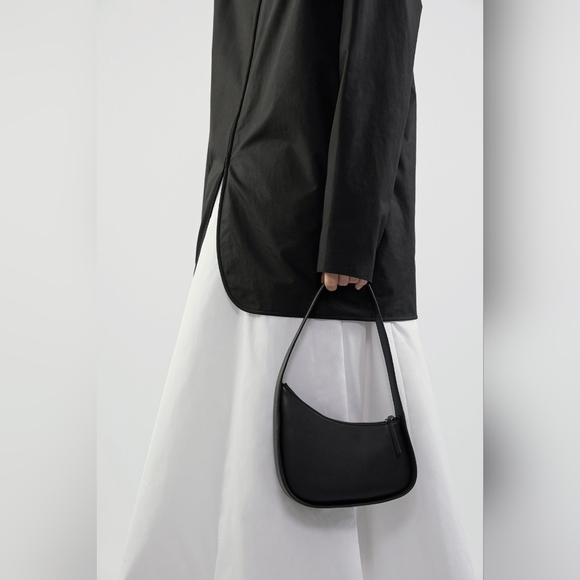 The Row Half Moon Bag in Black Leather - Picture 4 of 10